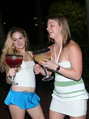 2 horny babes outside of a club fall to the floor drunk and fuck one another