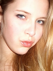 Hot teen poses in the mirror showing her nice tits